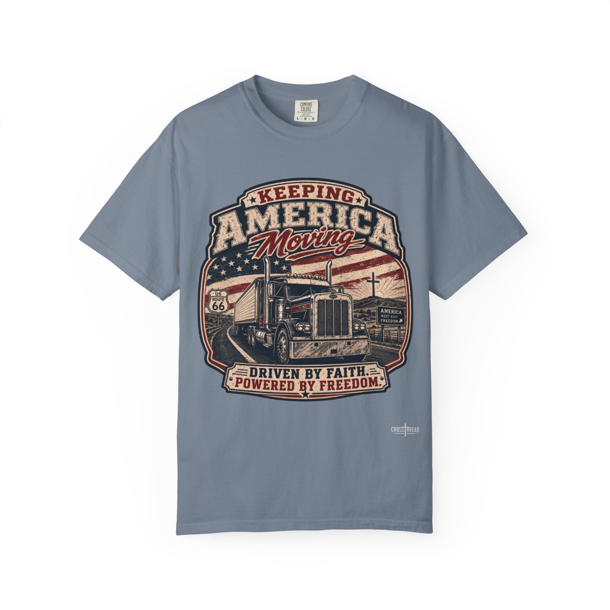 Keeping America Moving Trucker T‑Shirt — “Driven by Faith, Powered by Freedom” Vintage Semi Truck Tee